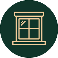 Ícono de ventana con cuatro paneles en un círculo verde oscuro.